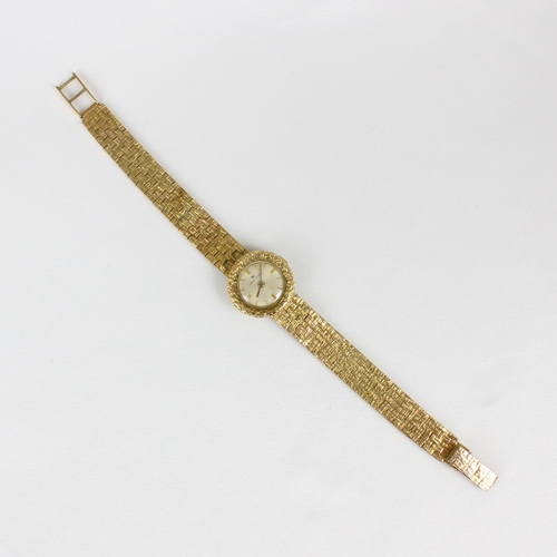 130 - A 9ct yellow gold Hamilton ladies wristwatch, the cream coloured circular dial with baton markers, s... 