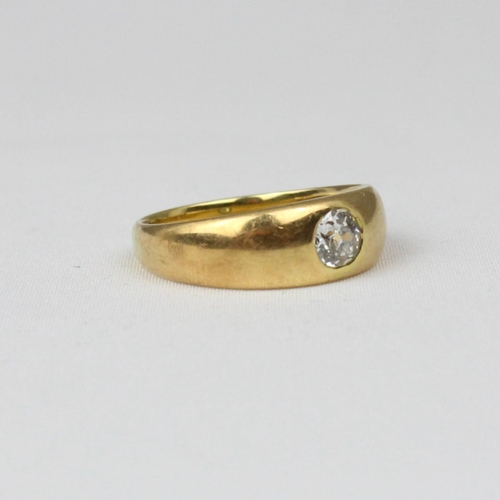 178 - A 19th century diamond ring, the old cut diamond within rubover yellow metal gypsy style tapered ban... 