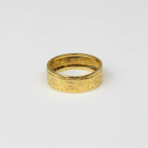 179 - A 22ct wedding band, in the Victorian style, engraved to front with floral detail and engraved to in... 