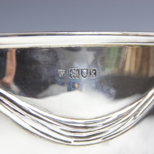 22 - An Edwardian silver rose bowl, Hunt & Roskell Ltd, London 1905, the half reeded body below garland e... 