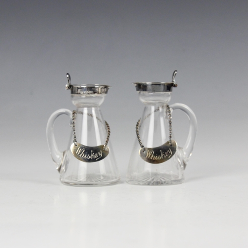 24 - A pair of Edwardian silver mounted whiskey tots/noggins, Lee and Wigfull, Sheffield 1904, the hinged... 