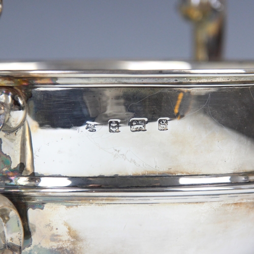 25 - An Edwardian silver twin handled bowl, The Alexander Clark Manufacturing Co, London 1906, the scroll... 