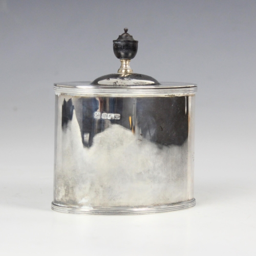 27 - An Edwardian silver tea caddy, Fordham & Faulkner, Sheffield 1904, the hinged cover above plain poli... 