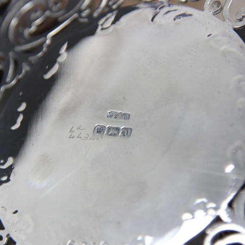 28 - An Edwardian silver bowl, James Dixon & Sons Ltd, Sheffield 1906, the gadrooned rim above a pierced ... 