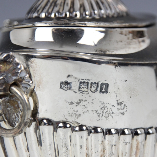 30 - An Edwardian silver tea caddy, Roberts & Belk Ltd, London 1906, the domed fluted cover above conform... 