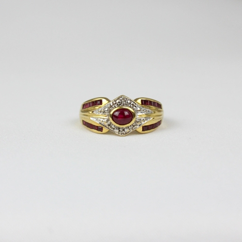 326 - A yellow metal ruby dress ring, the central cabochon within stylised surround of round cut diamond, ... 