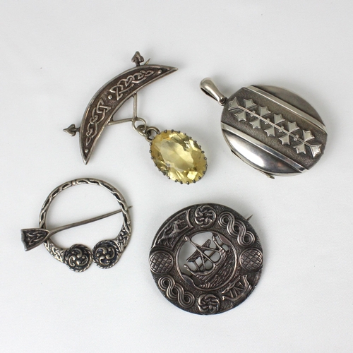 344 - A selection of silver and white metal jewellery, including a  Celtic style crescent brooch suspendin... 