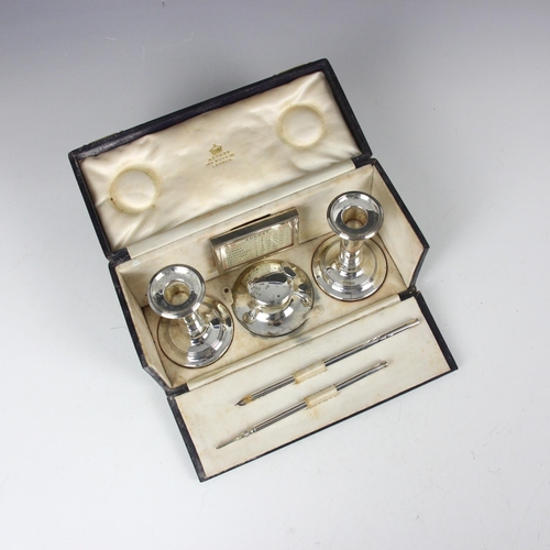 38 - An Edwardian silver mounted travelling desk set, Charles and George Asprey, Birmingham 1901/1905, co... 