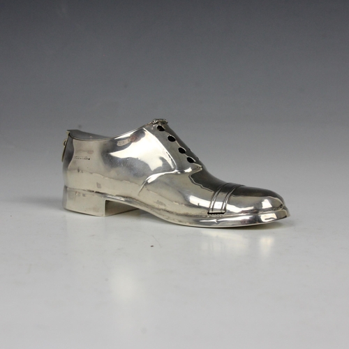 67 - An Edwardian novelty silver money box, S Blanckensee & Son Ltd, Birmingham 1909, modelled as a boot ... 