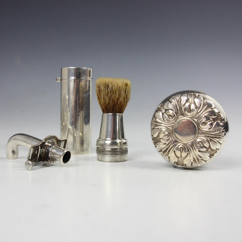 76 - A selection of silver, to include an American 'Gorham and Co’ white metal yoyo, with embossed stylis... 