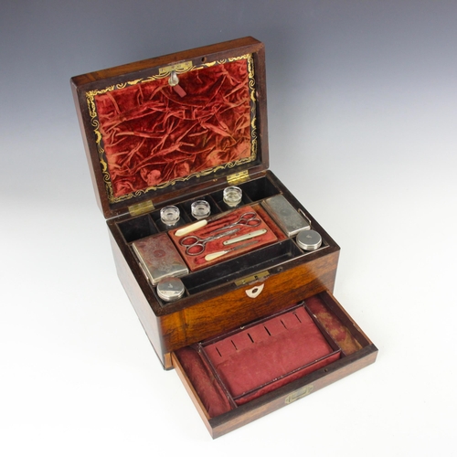 78 - A Victorian silver mounted travelling vanity case, William Neal, London 1842, the rectangular hinged... 