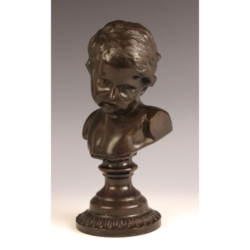 513 - A French patinated bronze bust modelled as a young child, late 19th century, on integral socle base,... 