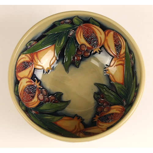 537 - A limited edition Moorcroft celadon bowl in the 'Green Pomegranate' pattern, designed by Nicola Slan... 