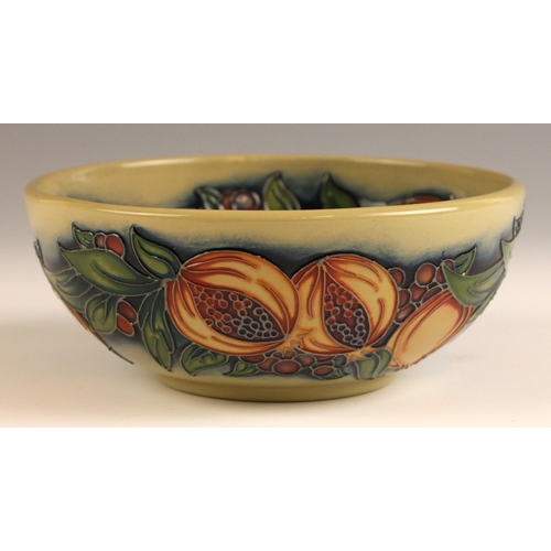 537 - A limited edition Moorcroft celadon bowl in the 'Green Pomegranate' pattern, designed by Nicola Slan... 