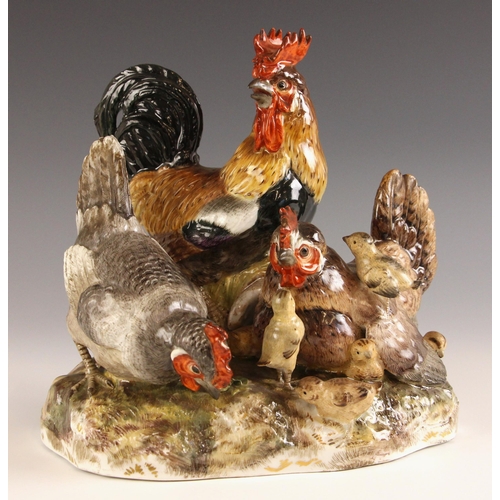 581 - A Meissen porcelain chicken group, 20th century, model number G163, designed by August Ringler circa... 