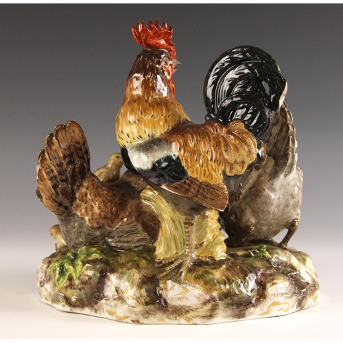 581 - A Meissen porcelain chicken group, 20th century, model number G163, designed by August Ringler circa... 