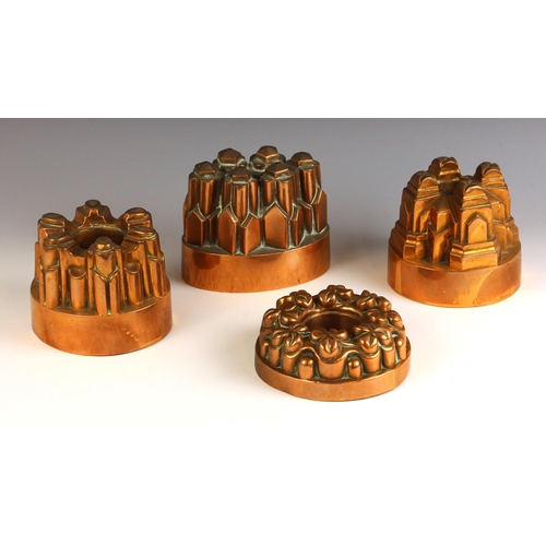 775 - Four Victorian copper jelly moulds in the manner of Benham & Froud, comprising: a ring form example ... 