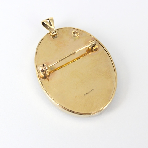 169 - An early 20th century 9ct pendant/brooch, the oval mounted watercolour depicting young lady highligh... 