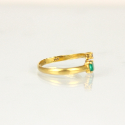 171 - A bespoke diamond and untested emerald ‘toi et moi’ ring, the square cut emerald within yellow metal... 