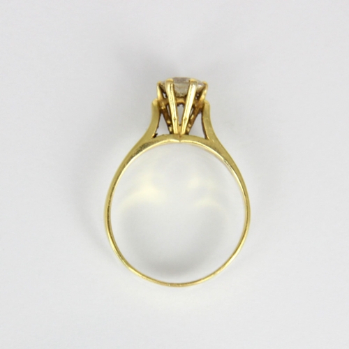 172 - A bespoke diamond solitaire ring, the central round cut diamond within raised yellow metal claw sett... 
