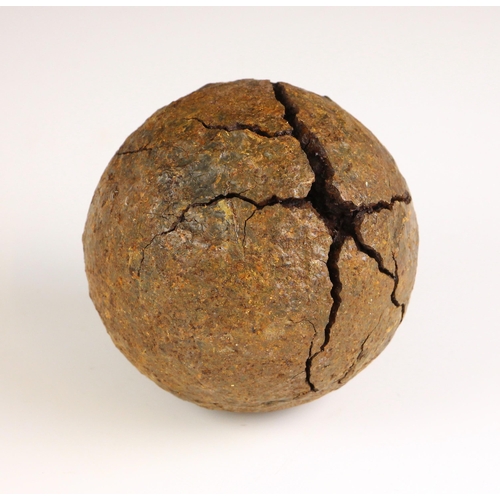 392 - An English Civil War canon ball, mid 17th century, of typical form, 10cm diameter