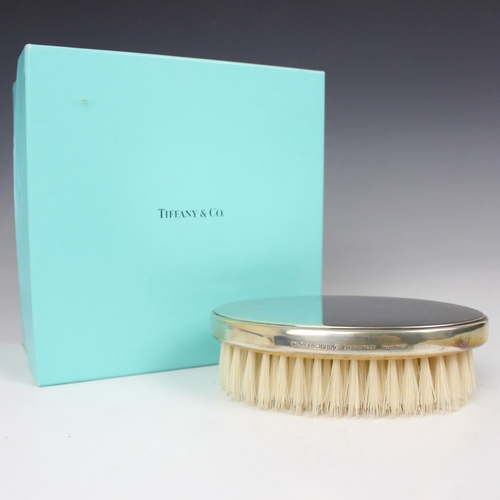 5 - A late 20th century silver Tiffany and Co clothes brush, Birmingham 1995, of plain polished form, st... 