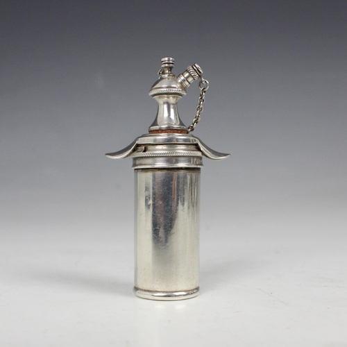 7 - An early 20th century silver scent atomiser, import marks for London 1913, of cylindrical form with ... 