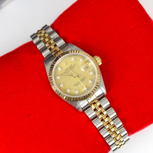 149 - A ladies bi-metal Rolex oyster perpetual datejust wristwatch, the circular champagne dial set with t... 