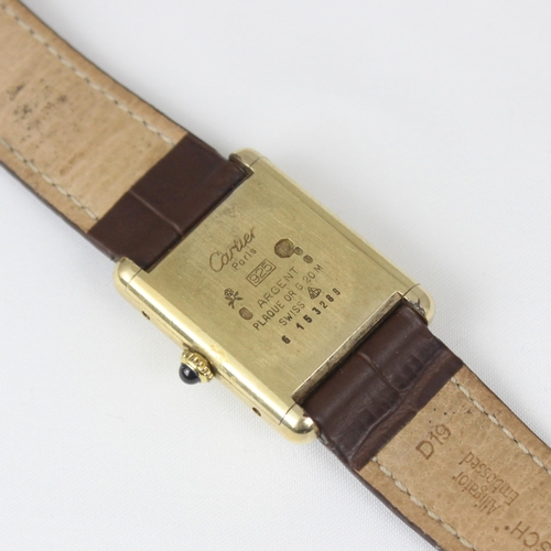 151 - A Must de Cartier 'tank' wristwatch, the rectangular three toned striped dial, set to plain polished... 