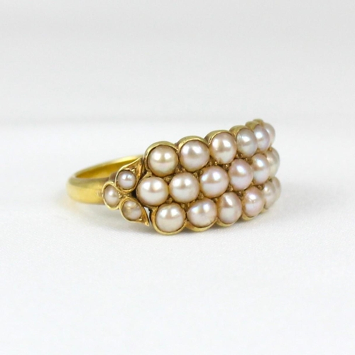 365 - A late 19th/early 20th century 'pearl' ring, the triple row of split pearls, with smaller triple spl... 