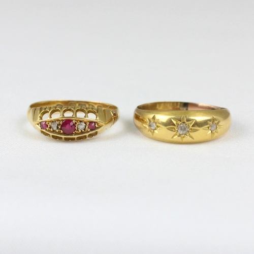 367 - An early 20th century ruby and diamond ring, the three graduated rubies with rose cut diamonds set i... 