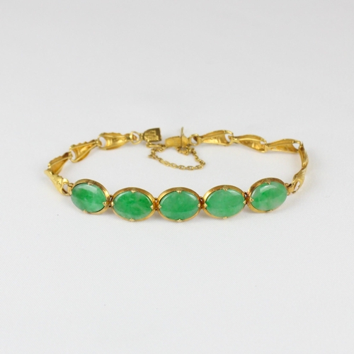 372 - A Chinese yellow metal 'jade' bracelet, composed of five panels, closed to the reverse, upon stylise... 