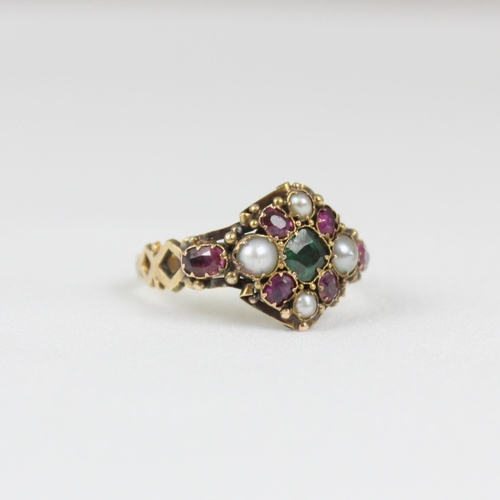 379 - An early 20th century 18ct gold ruby, emerald and 'pearl' ring, the central emerald surrounded by ru... 