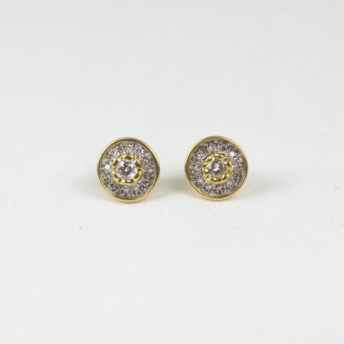 384 - A pair of 18ct yellow gold diamond cluster earrings, the round cut diamond within surround of twelve... 