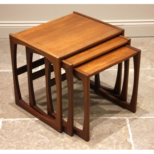 1001 - A G Plan 'Quadrille' nest of three teak tables, mid 20th century, upon curved supports and stretcher... 