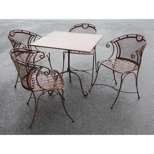 1008 - A wrought iron patio/garden set, comprising; four tub form chairs each with a lattice mesh back rest... 