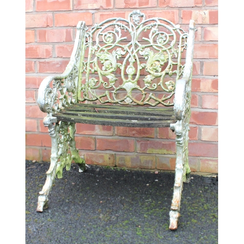 1011 - A Coalbrookdale type cast iron garden chair, 19th century, cast as naturalistic branches and scrolli... 