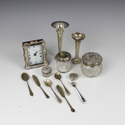 104 - A selection of silver to include a Carr’s of Sheffield silver mounted timepiece, Sheffield 1989, of ... 