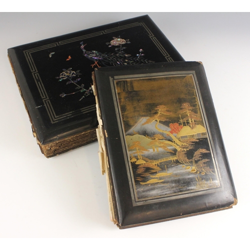 400 - A Chinoiserie lacquered album containing a collection of postcards from the first quarter of the 20t... 