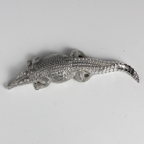 82 - A Patrick Mavros silver model of a crocodile, with realistic detail throughout, stamped with import ... 