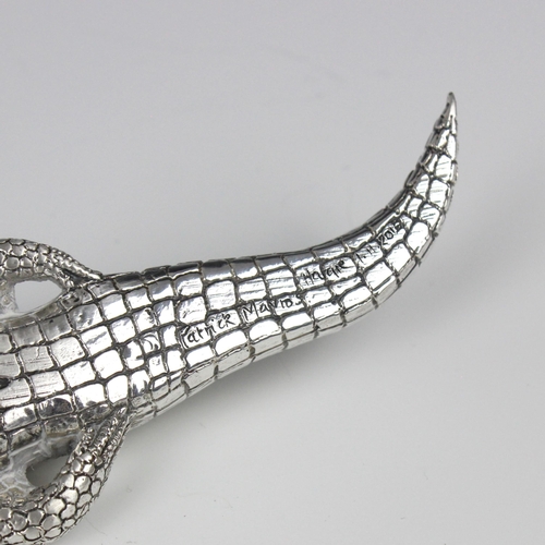 82 - A Patrick Mavros silver model of a crocodile, with realistic detail throughout, stamped with import ... 