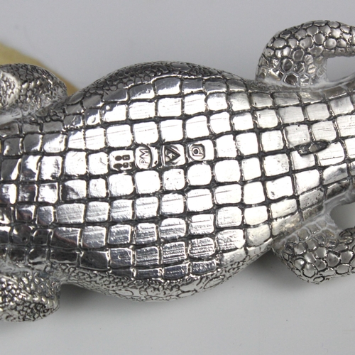 82 - A Patrick Mavros silver model of a crocodile, with realistic detail throughout, stamped with import ... 