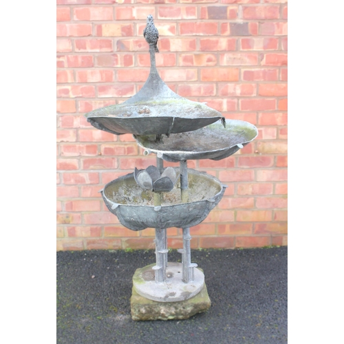 1014 - David Howarth (active 1984–1999), A galvanised metal lotus pod waterfall fountain, constructed with ... 