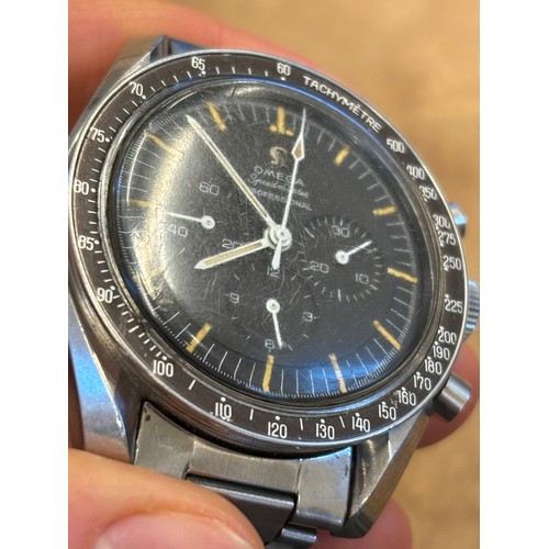 155 - An Omega stainless steel Speedmaster professional wristwatch, the black dial with luminous hands and... 