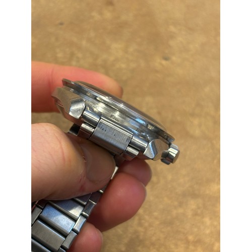 155 - An Omega stainless steel Speedmaster professional wristwatch, the black dial with luminous hands and... 