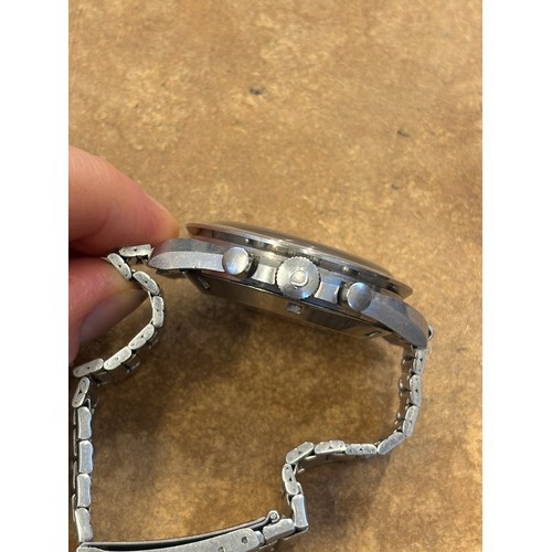 155 - An Omega stainless steel Speedmaster professional wristwatch, the black dial with luminous hands and... 