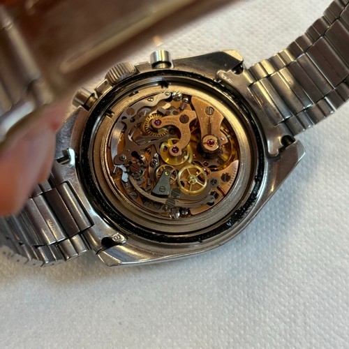 155 - An Omega stainless steel Speedmaster professional wristwatch, the black dial with luminous hands and... 