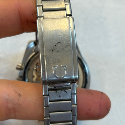 155 - An Omega stainless steel Speedmaster professional wristwatch, the black dial with luminous hands and... 