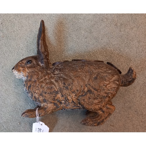 517 - A cold painted spelter model of a rabbit in the manner of Bergman, 20th century, the body designed a... 