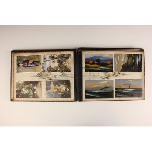 400 - A Chinoiserie lacquered album containing a collection of postcards from the first quarter of the 20t... 